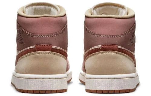 Nike Air Jordan 1 Mid SE sneakers feature a unique color scheme of "Barely Orange," "Pale Ivory," and "Smokey Mauve"
