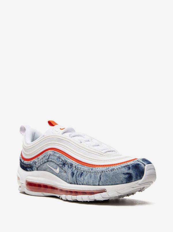 Nike Air Max 97 "Washed Denim Pack" sneakers, recognizable by their unique blue denim texture paired with bright red accents and a white sole.