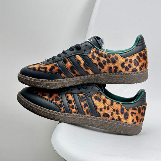 Adidas Samba OG sneakers in a black and leopard print colorway