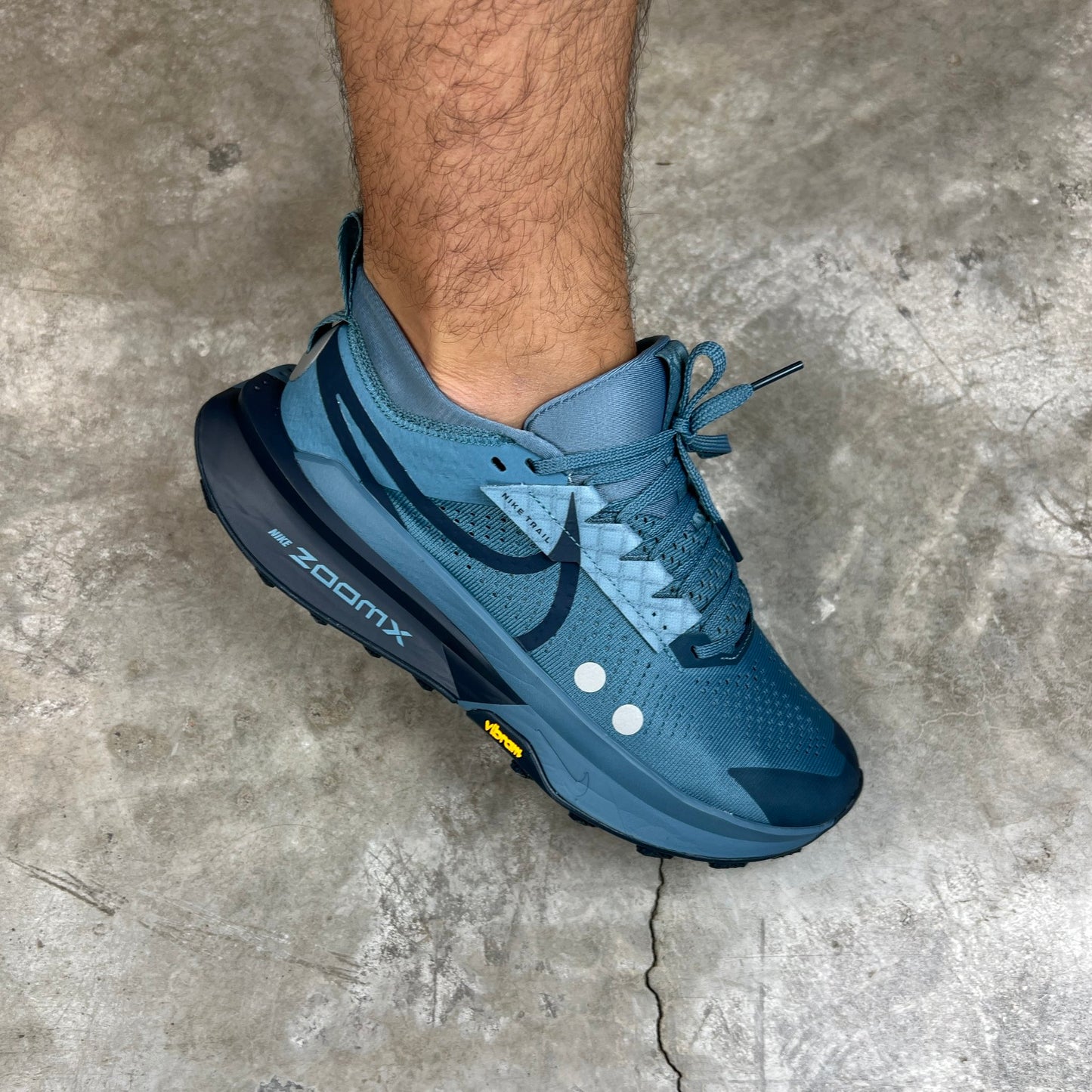 Nike Zegama Trail 2 is highlighted by its Smokey Blue colorway and rugged Vibram® outsole.
