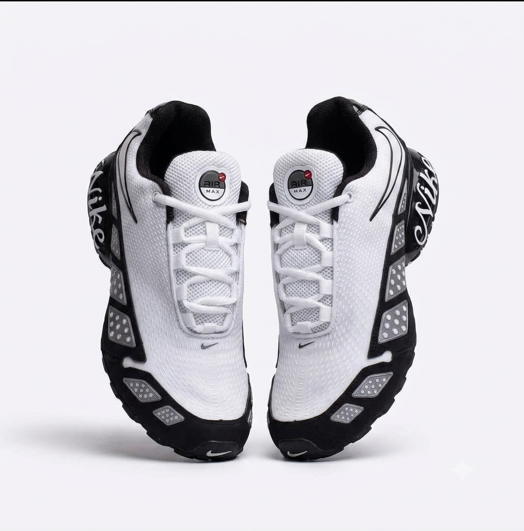 Nike Air Max Sunder sneakers featuring a white upper with black accents and a cursive "Nike" logo on the side