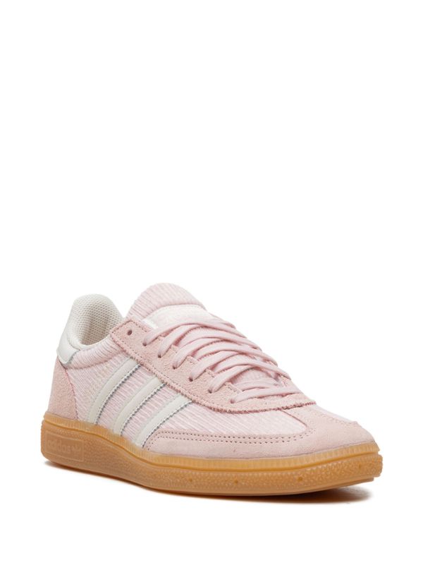 Adidas Handball Spezial sneakers in a sandy pink color with a corduroy upper.