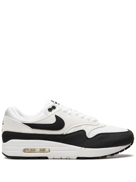 Nike Air Max 1 "Panda" sneakers in white and black with a panelled mesh upper and signature Swoosh logo.
