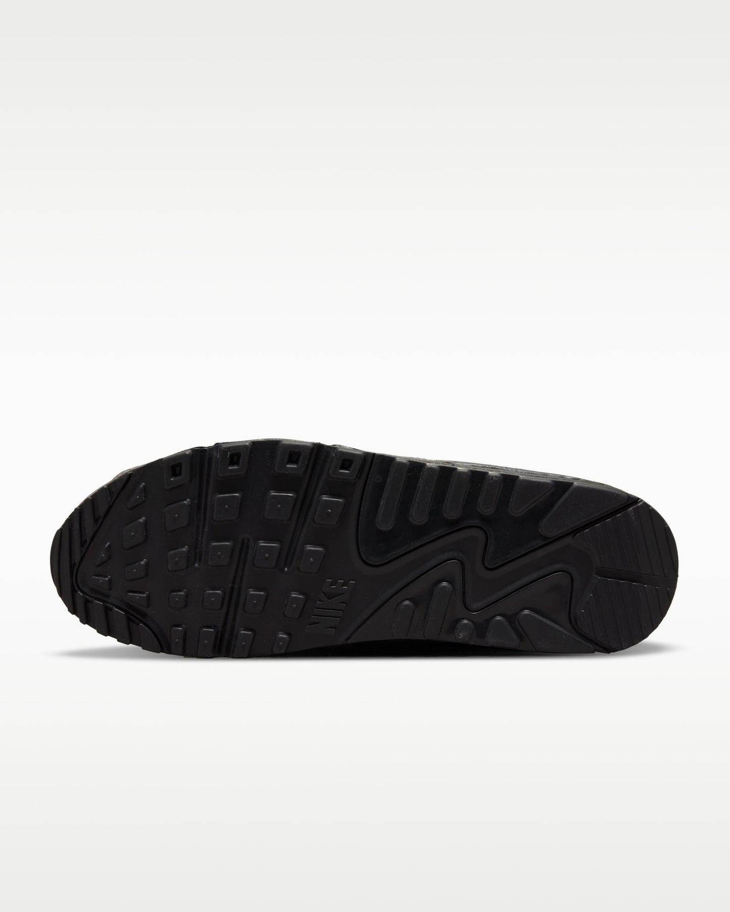 Nike Air Max 90 sneakers featuring a grey suede and mesh upper with a black midsole and swoosh.
