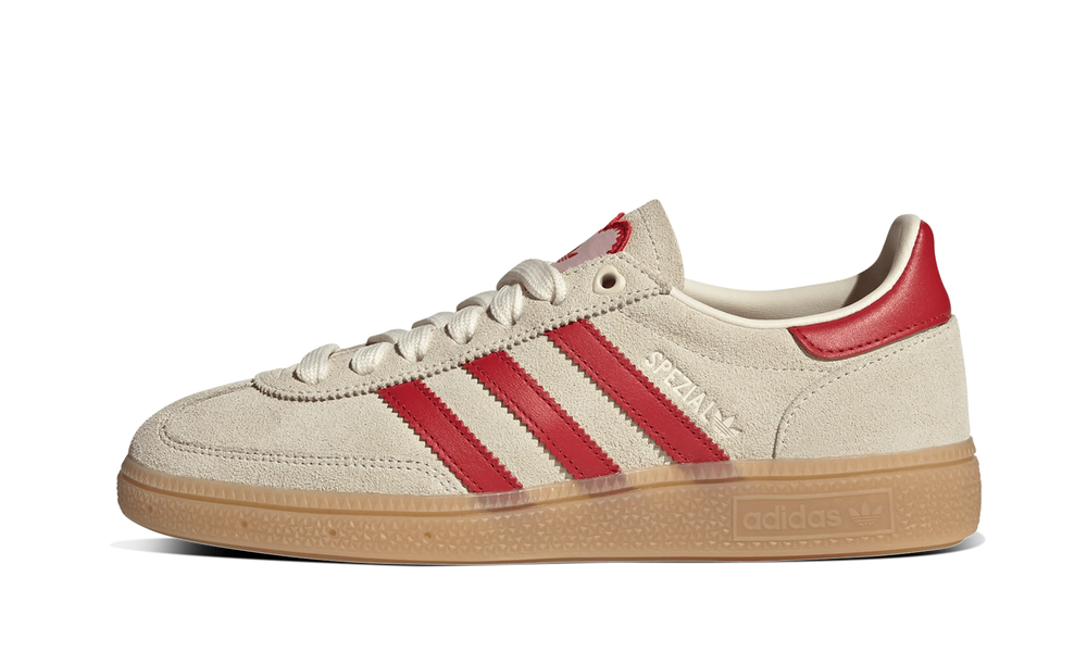 Adidas Handball Spezial sneakers in an off-white and red colorway,