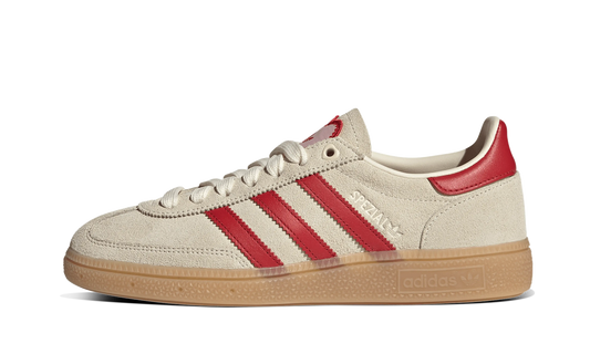 Adidas Handball Spezial sneakers in an off-white and red colorway,