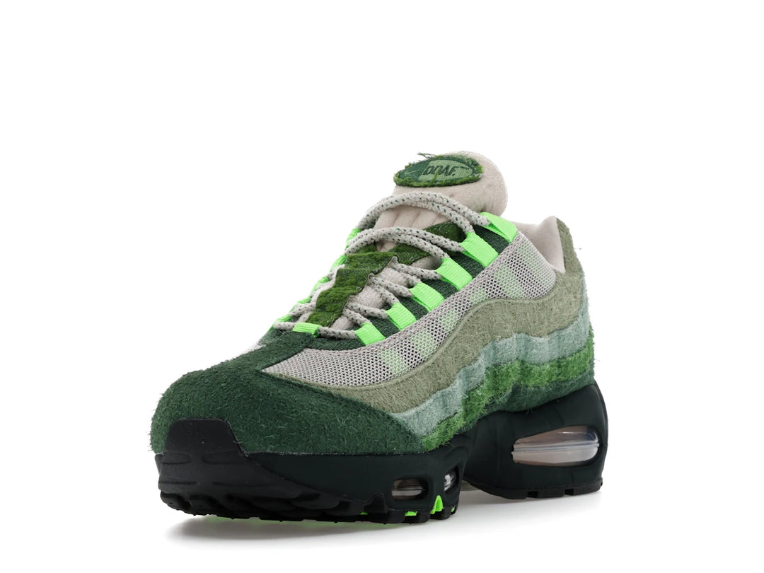 Nike Air Max 95 "Ducks of a Feather" sneakers in "The Woods" colorway, featuring shaggy green suede and moss-like overlays.