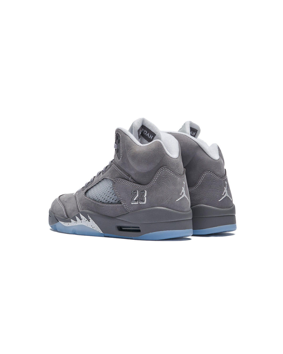 Nike Air Jordan 5 "Wolf Grey" sneakers, recognizable by their light graphite suede upper and translucent icy outsole.