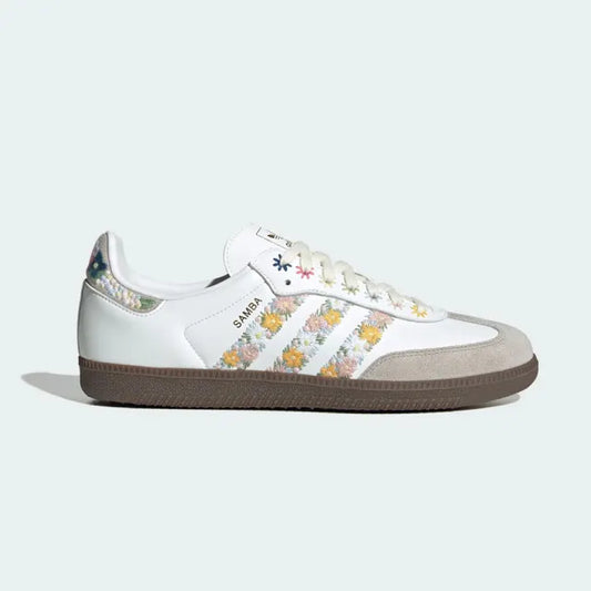 Adidas Samba "Floral Embroidery" sneakers, featuring a white leather upper decorated with embroidered colorful flowers.